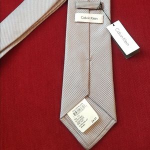 Brand new Calvin Klein silver tie